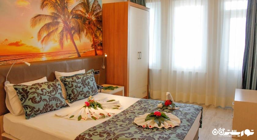 تخت بزرگ آپارتمان دو خوابه